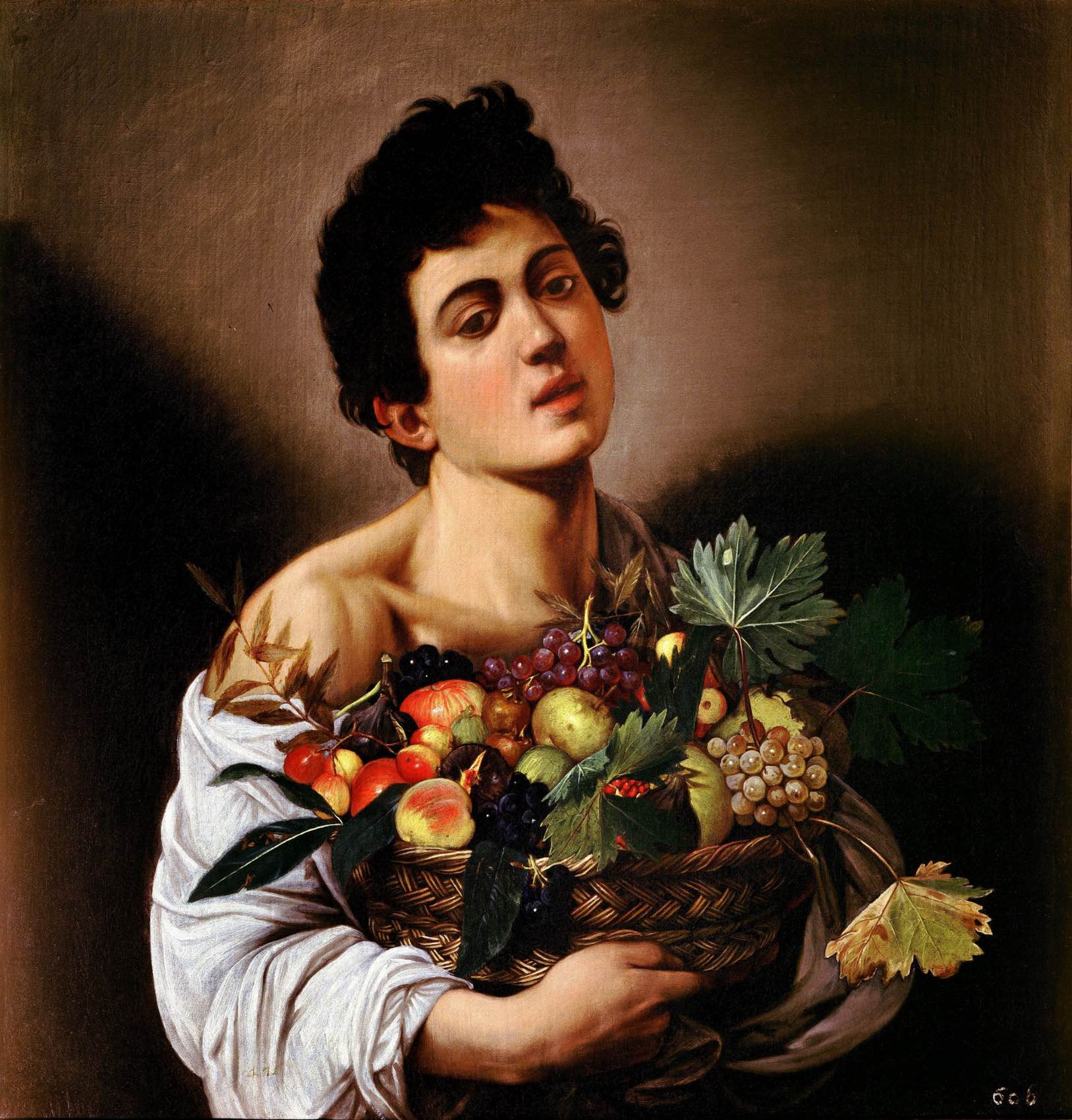 boy with a basket of fruit